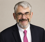 A headshot of Daniel L. Kastner.